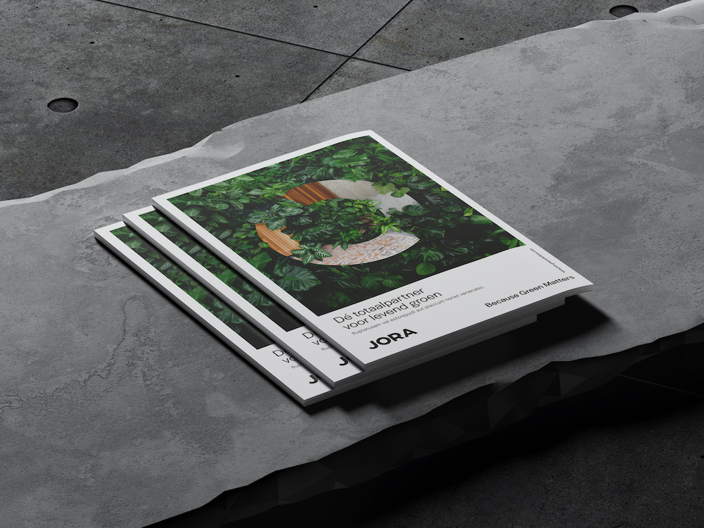 Magazines van het merk JORA op een stenen ondergrond
